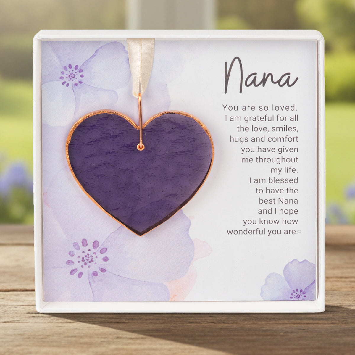 Handmade 3" textured purple glass heart with Nana sentiment in white box with clear lid.