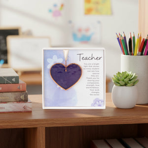4 of 5:Teacher gift in a teacher's classroom on a bookshelf.