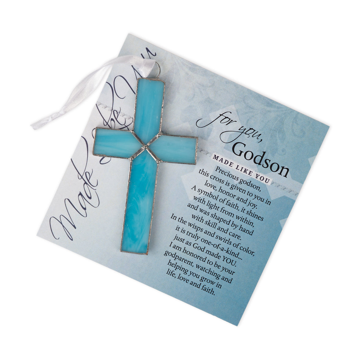 Light blue stained glass cross lying on the "For You, Godson" sentiment artwork.