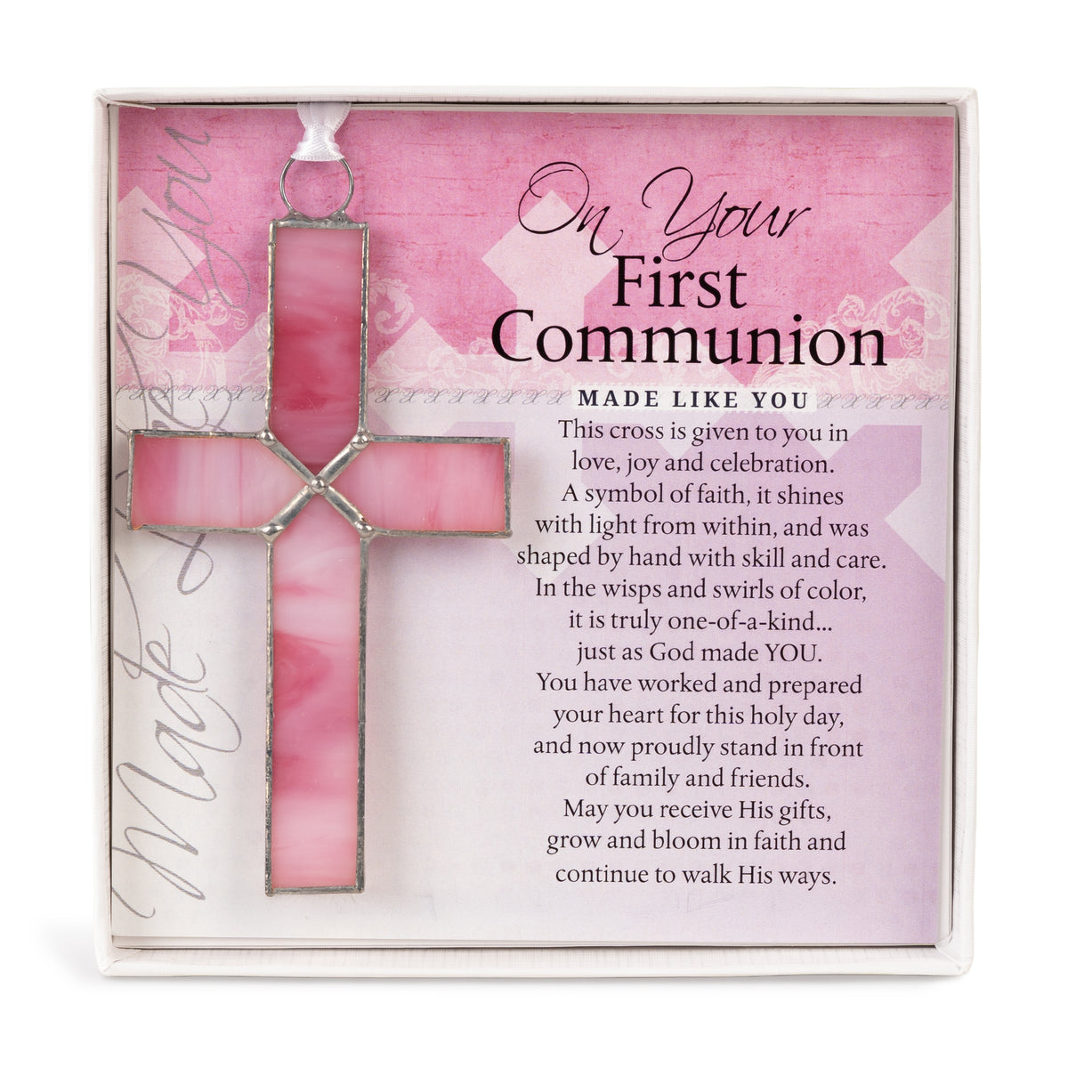 First Communion Gift - 4 1/4" pink stained glass cross and "On Your First Communion" sentiment in white box with clear lid.