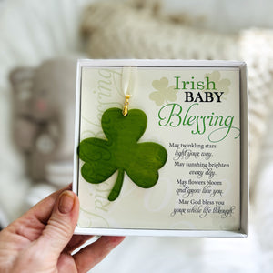 5 of 6:Irish Baby Blessing gift being held in a hand.
