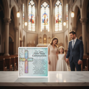 2 of 5:Parents celebrating their child's First Holy Communion with the product displayed in front of them.