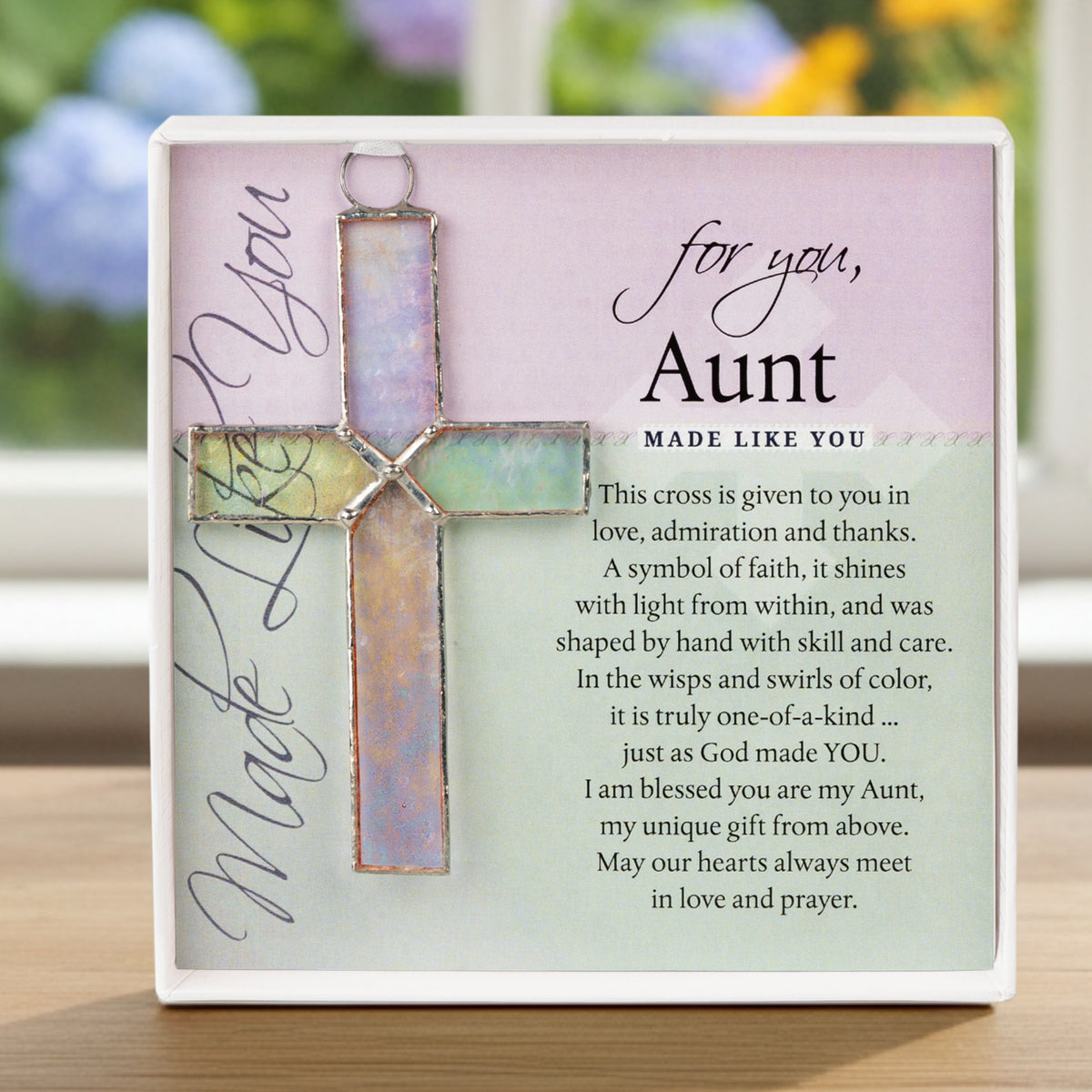 For You Aunt: Handmade clear iridescent stained glass cross and sentiment; packaged in a white 5.5"x5.5" box with a clear lid.