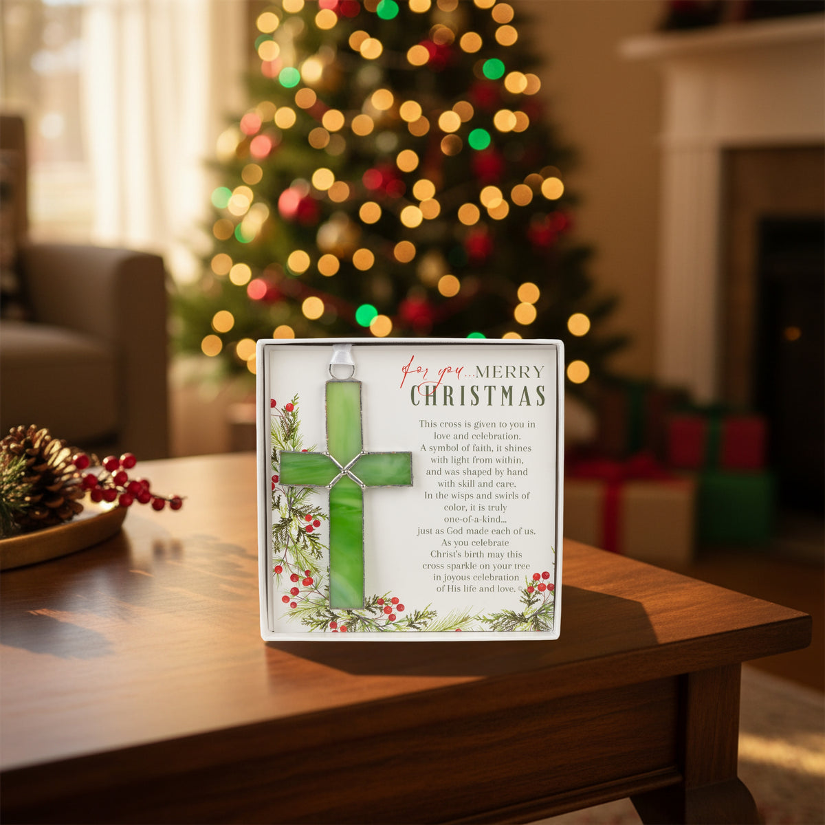 Gift displayed on a coffee table with Christmas decorations in the back.