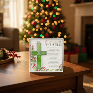 4 of 4:Gift displayed on a coffee table with Christmas decorations in the back.