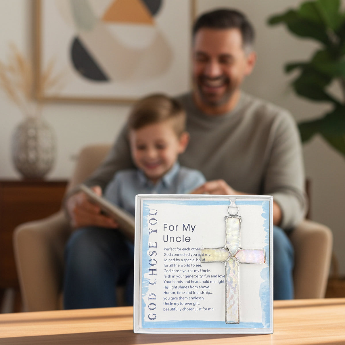 "God Chose You for My Uncle" gift in on a table in front of an uncle and his nephew.