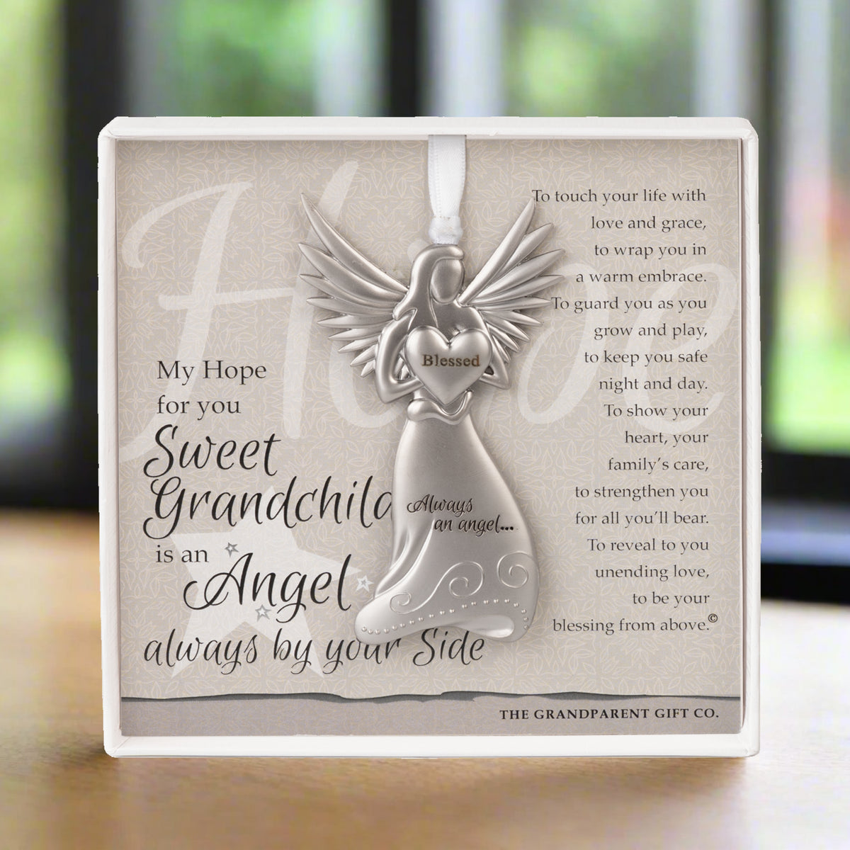 Grandchild Gift- 4" metal blessed angel ornament with "Sweet Grandchild" poem in white box with clear lid.