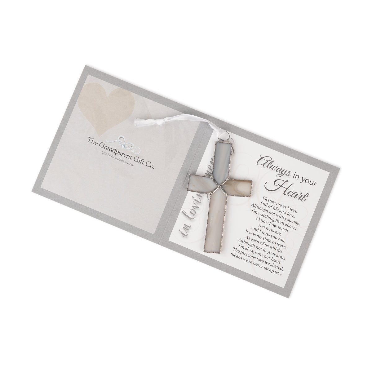 Gray cross laying on the "Always in your Heart" folded card sentiment.
