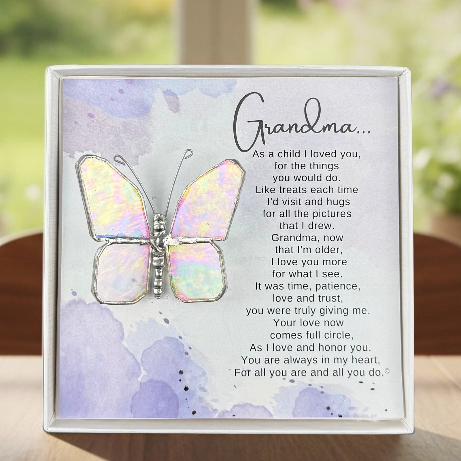 Stained glass butterfly packaged with "Grandma" Poem in a white box with a clear lid.