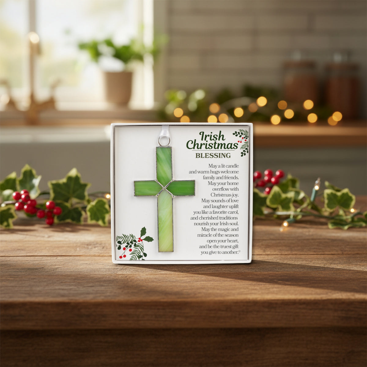 Irish Christmas Blessing cross displayed on a kitchen counter by holly berry and ivy.