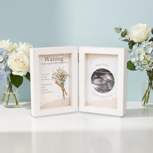 1 of 5:Ultrasound frame with sentiment and an image of baby's breath on one side and artwork with a 2 1/2