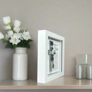 6 of 7:Side view of shadowbox frame shown standing up straight without optional easel back.