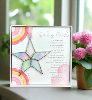 10 of 10:Baby Girl Star in front of window