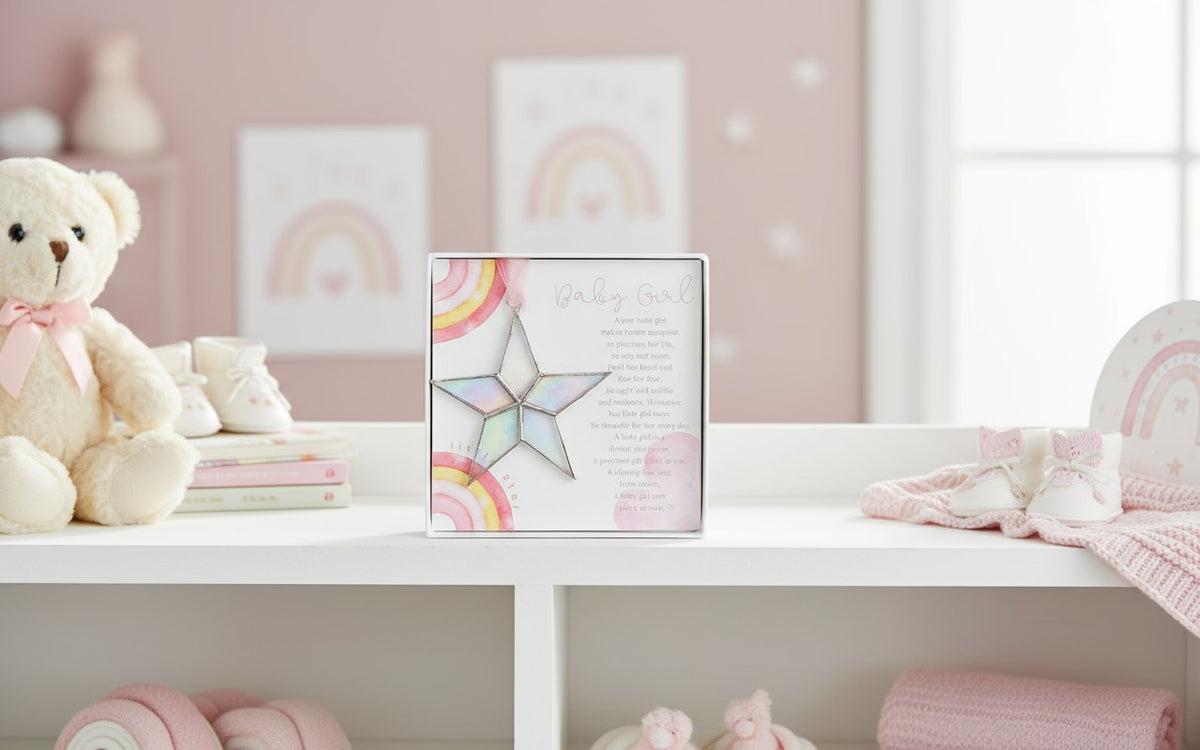 Baby Girl Star on a bookshelf in a baby's room.