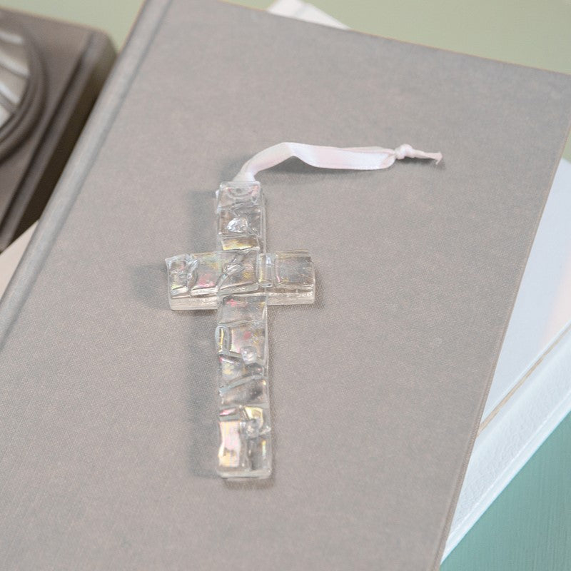 Iridescent clear mosaic cross with white satin ribbon for hanging.