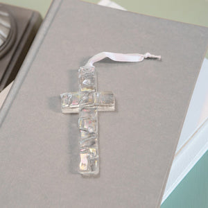 3 of 5:Iridescent clear mosaic cross with white satin ribbon for hanging.