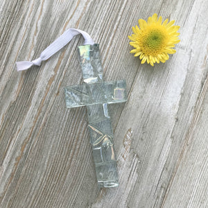 2 of 7:Iridescent clear mosaic cross with white satin ribbon for hanging.