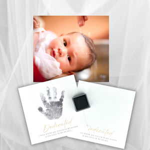 4 of 8:Frame comes with a sample piece of art with a handprint, a blank piece of art for the child's handprint, and an ink pad.