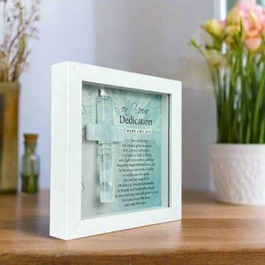 5 of 6:Framed Dedication cross on a desk.