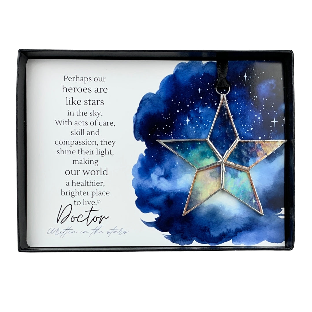 Handmade 4" clear iridescent stained-glass star with silver edging, packaged with "Doctor" sentiment in black gift box with clear lid.