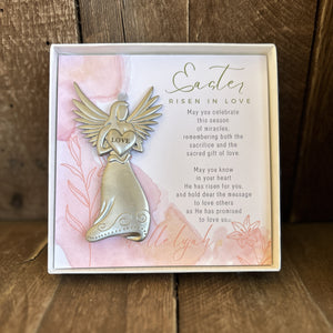 4 of 6:Silver toned metal angel holding a heart with the word