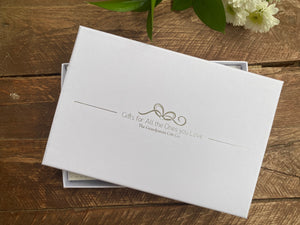 7 of 10:High quality white box with linen finish.