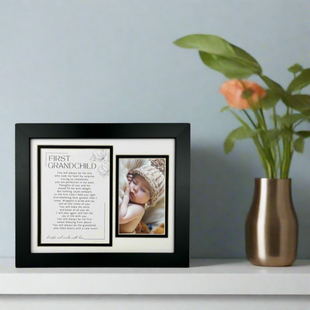 First Grandchild Frame on a fireplace mantle.