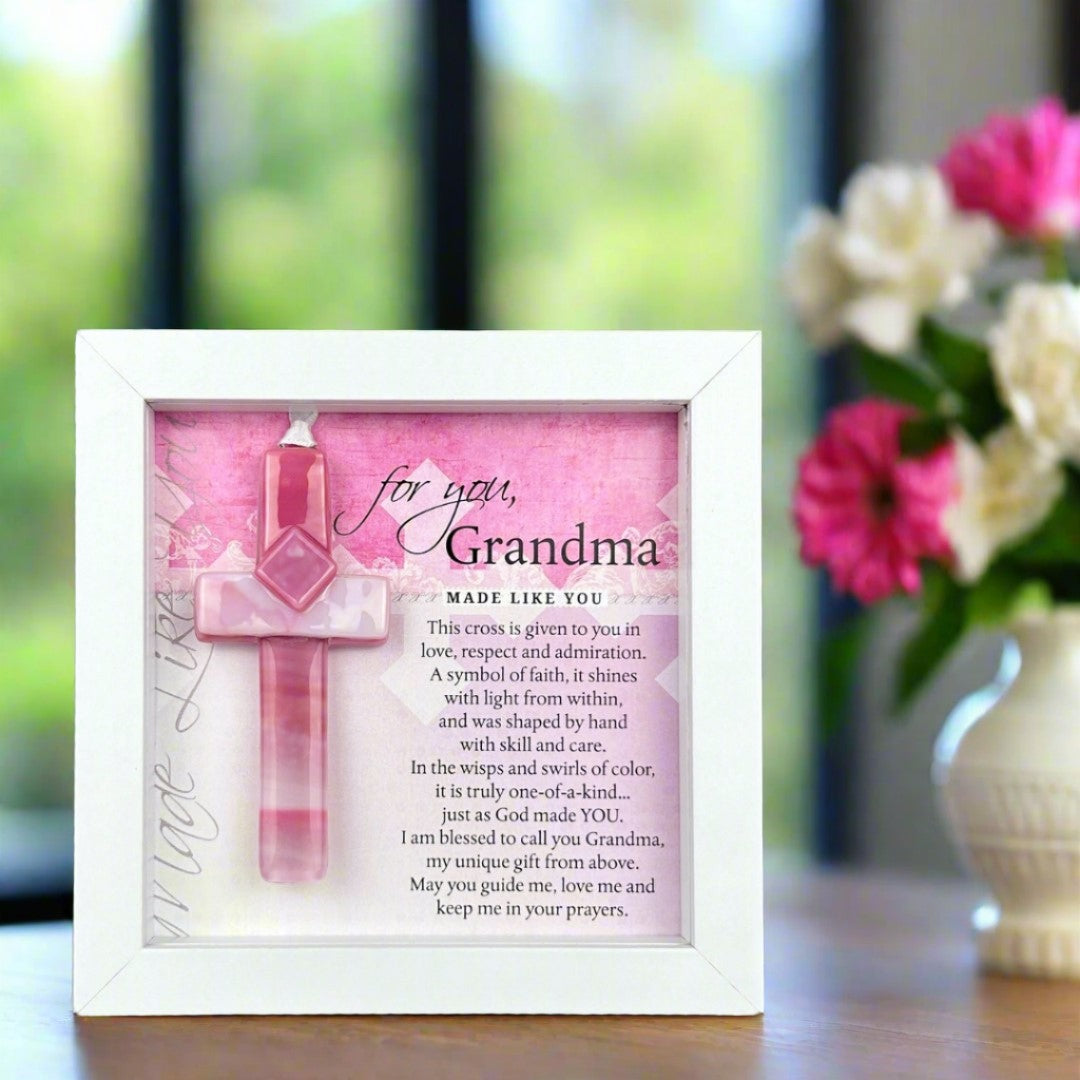 Framed Grandma Cross Gift sitting on a desk.
