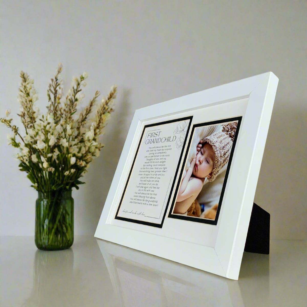 Side view of white First Grandchild frame showing easel back.