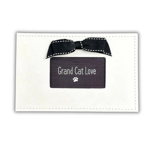 4 of 4:White photo album for photos of Grand Cat.