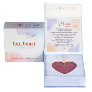 2 of 8:Her Heart for Mom, now that I'm a mother gift box shown closed and open.  Open box features sentiment card and heart resting in foam cushion.