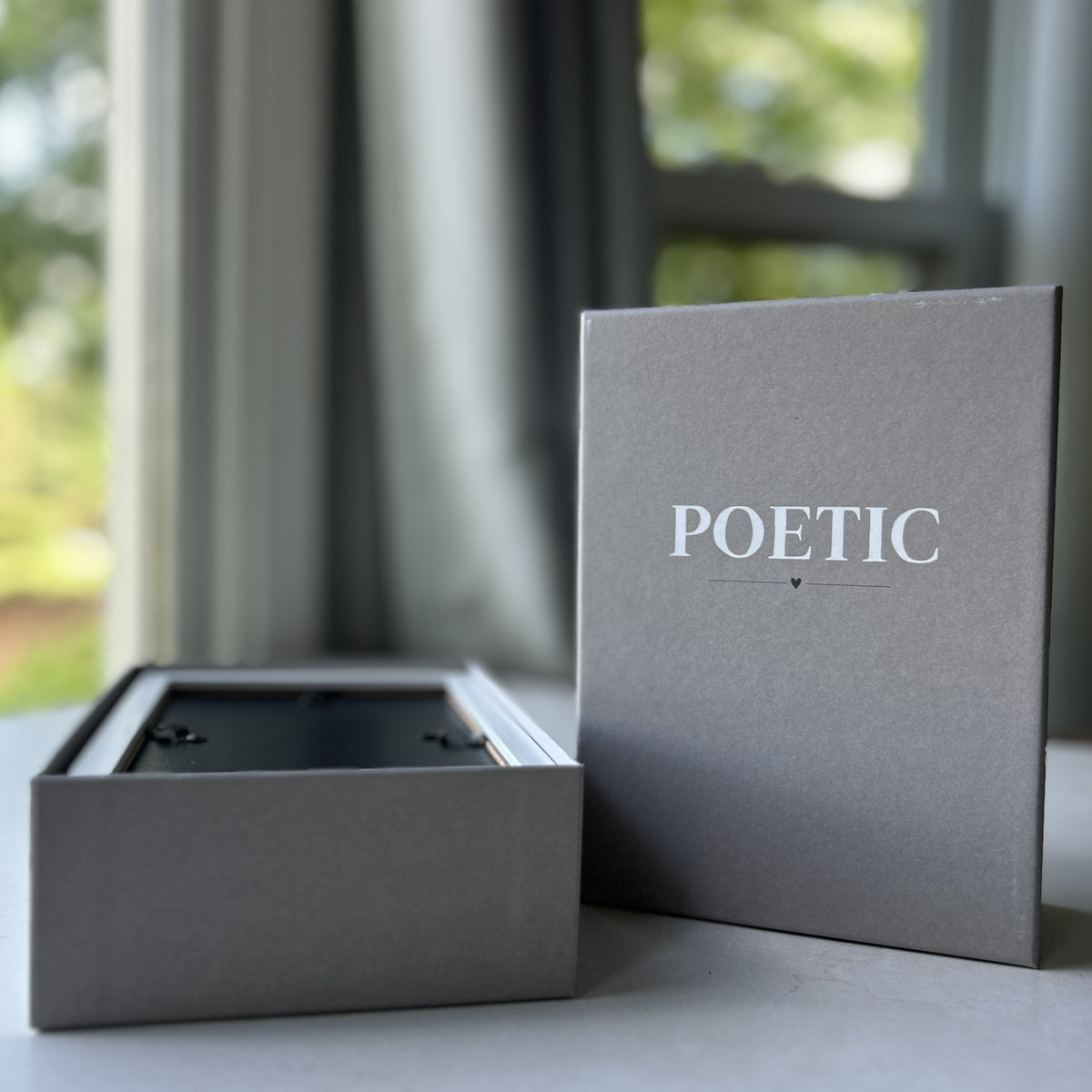 Poetic two part box for frame.