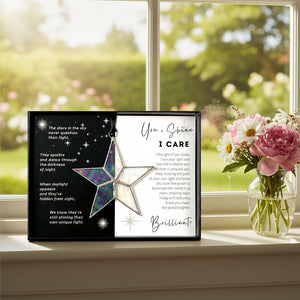 2 of 8:I Care Star on a windowsill.