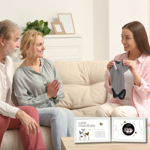 7 of 7:A soon to be mom announcing her pregnancy with the Little Grandbaby Ultrasound frame.