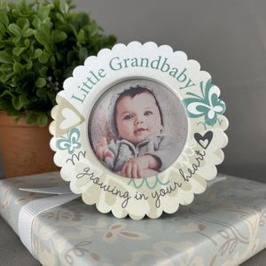 4 of 5:Frame for grandma or grandpa on top of a wrapped gift.