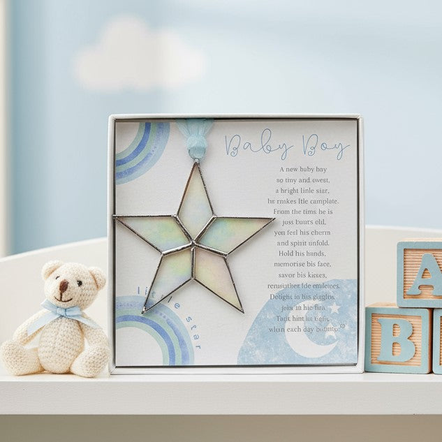 Handmade 4" clear iridescent stained-glass star with silver edging, packaged with "Baby Boy" sentiment in white gift box with clear lid.