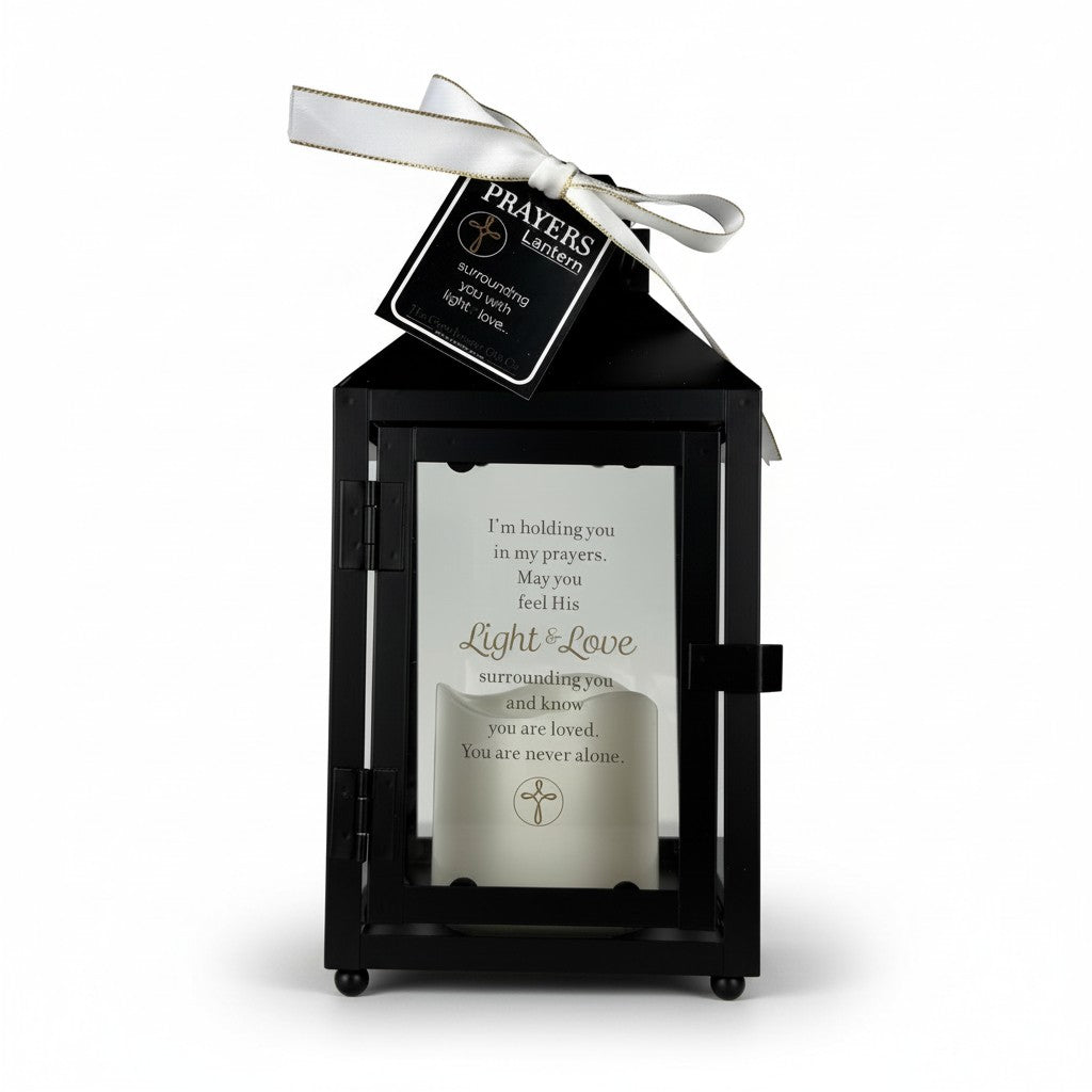 Holding You in My Prayers black metal lantern with flickering built in candle, printed sentiment on glass panel and gift tag.