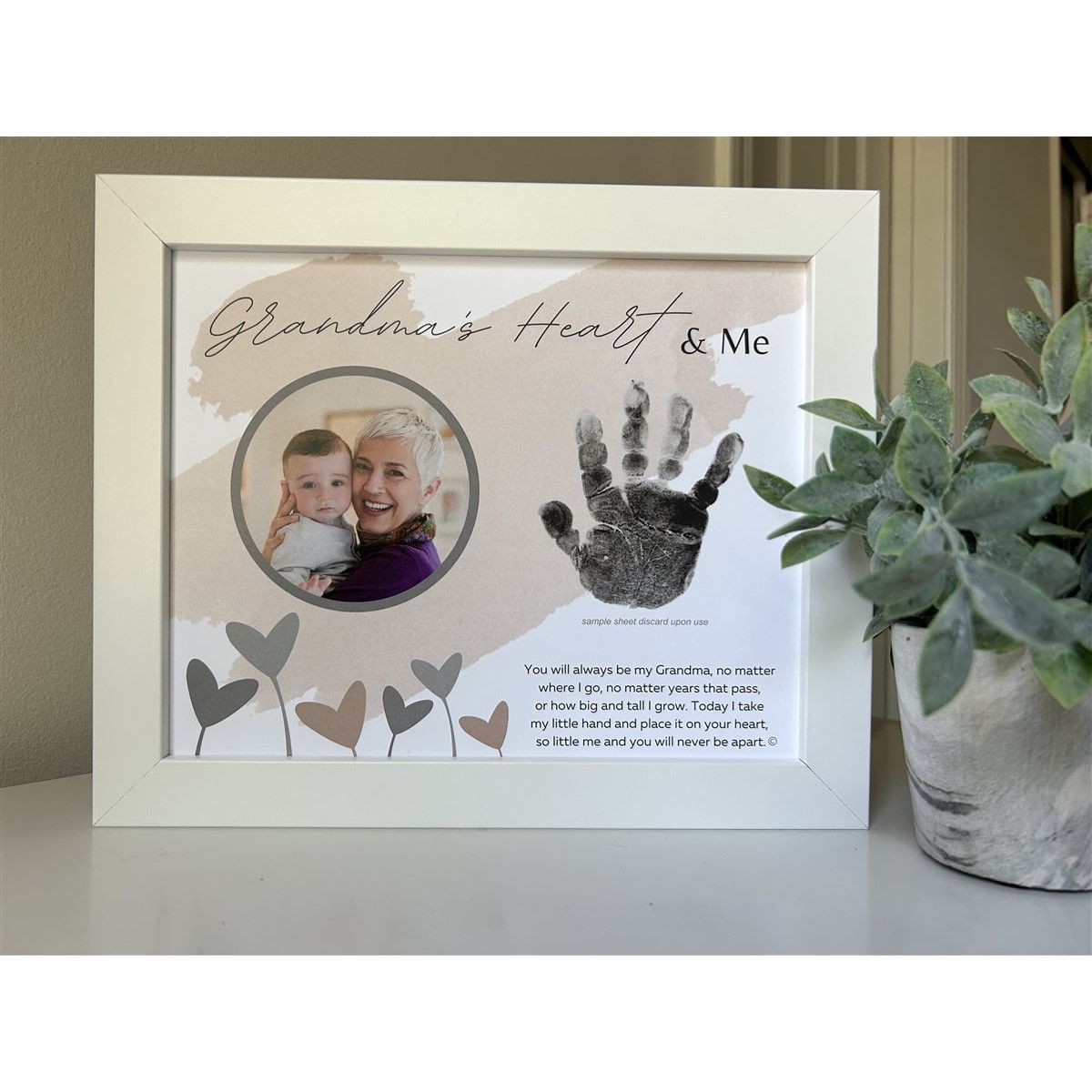 8x10 white frame with &quot;Grandma&#39;s Heart &amp; Me&quot; artwork with poem, space for a handprint, and a circular opening for a photograph.