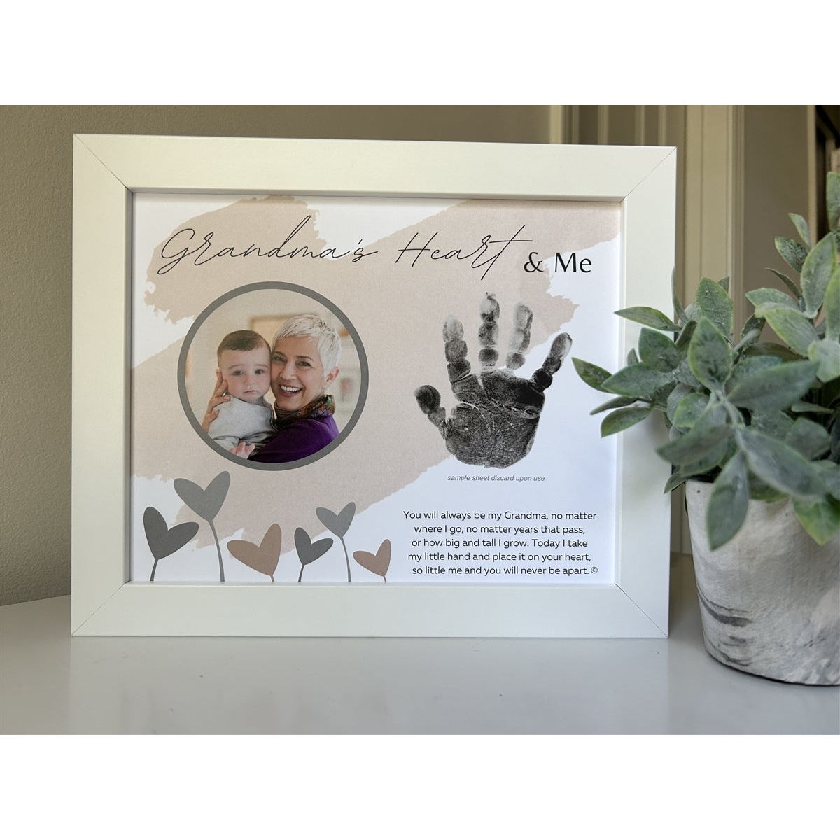 8x10 white frame with "Grandma's Heart & Me" artwork with poem, space for a handprint, and a circular opening for a photograph.