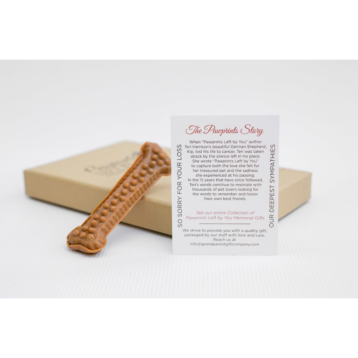 Enclosed card with the pawprints story.