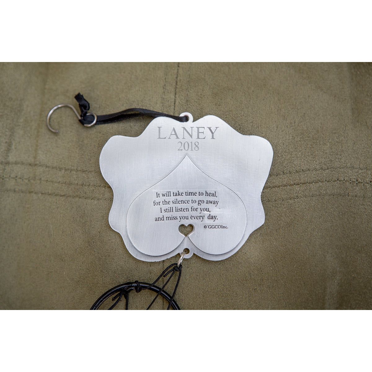 Back of windchime shown with customer completed engraving.