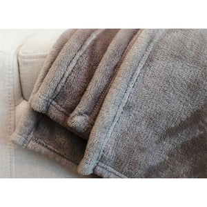 6 of 9:Close up photo of the corner of the blanket showing the soft fibers.