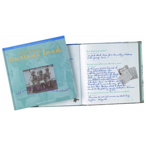 1 of 8:A Grandparents' Memory Book closed sitting on top of a filled out memory book.