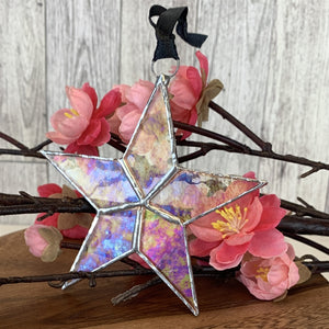 5 of 7:Clear iridescent stained glass star with silver edging with black satin ribbon.