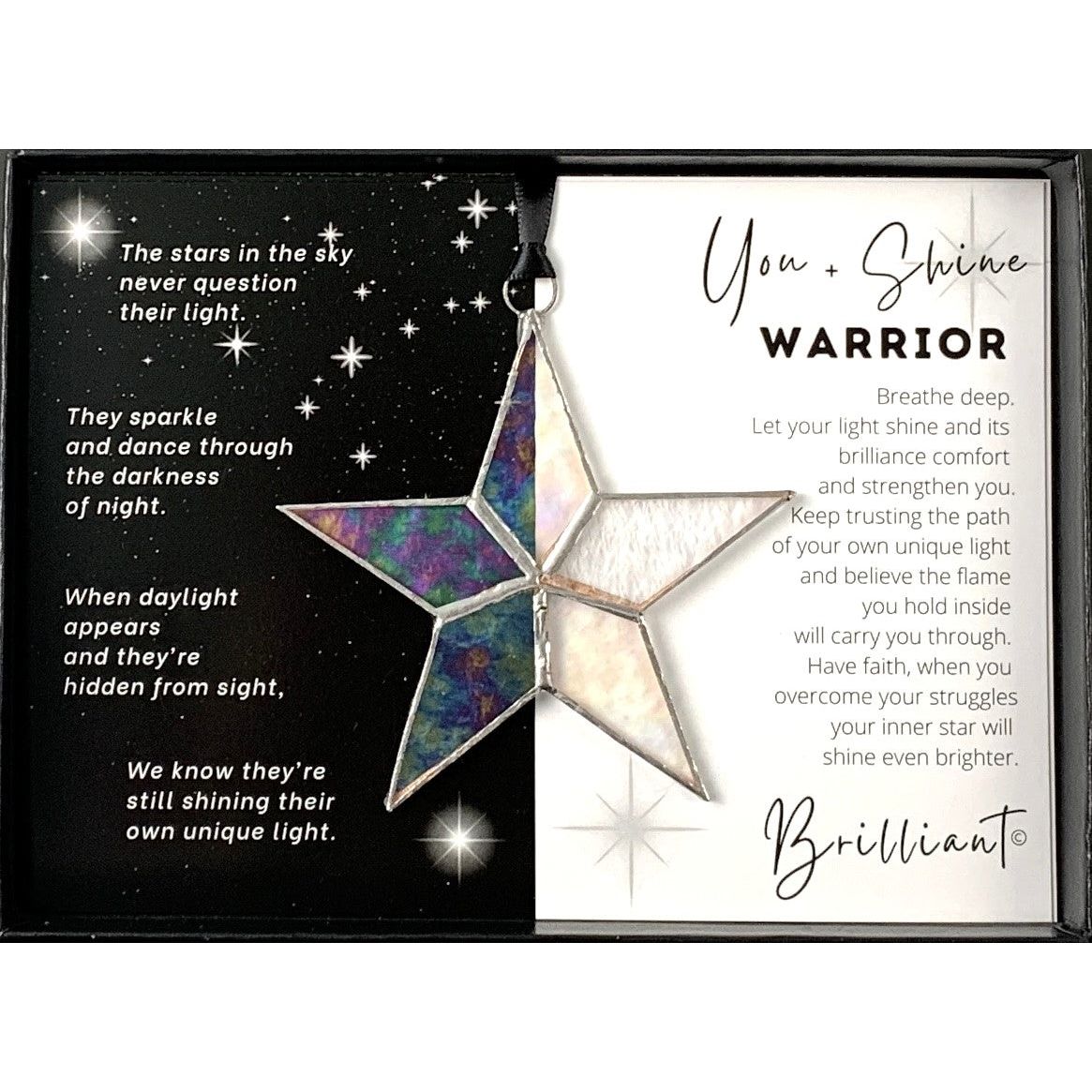 Handmade 4&quot; clear iridescent stained glass star with silver edging, packaged with &quot;You + Shine Warrior&quot; sentiment in black gift box with clear lid.