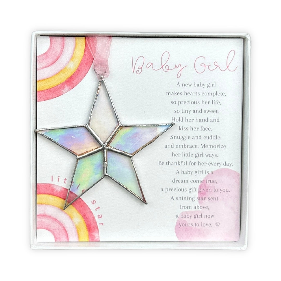 Handmade 4" clear iridescent stained-glass star with silver edging, packaged with "Baby Girl" sentiment in white gift box with clear lid.
