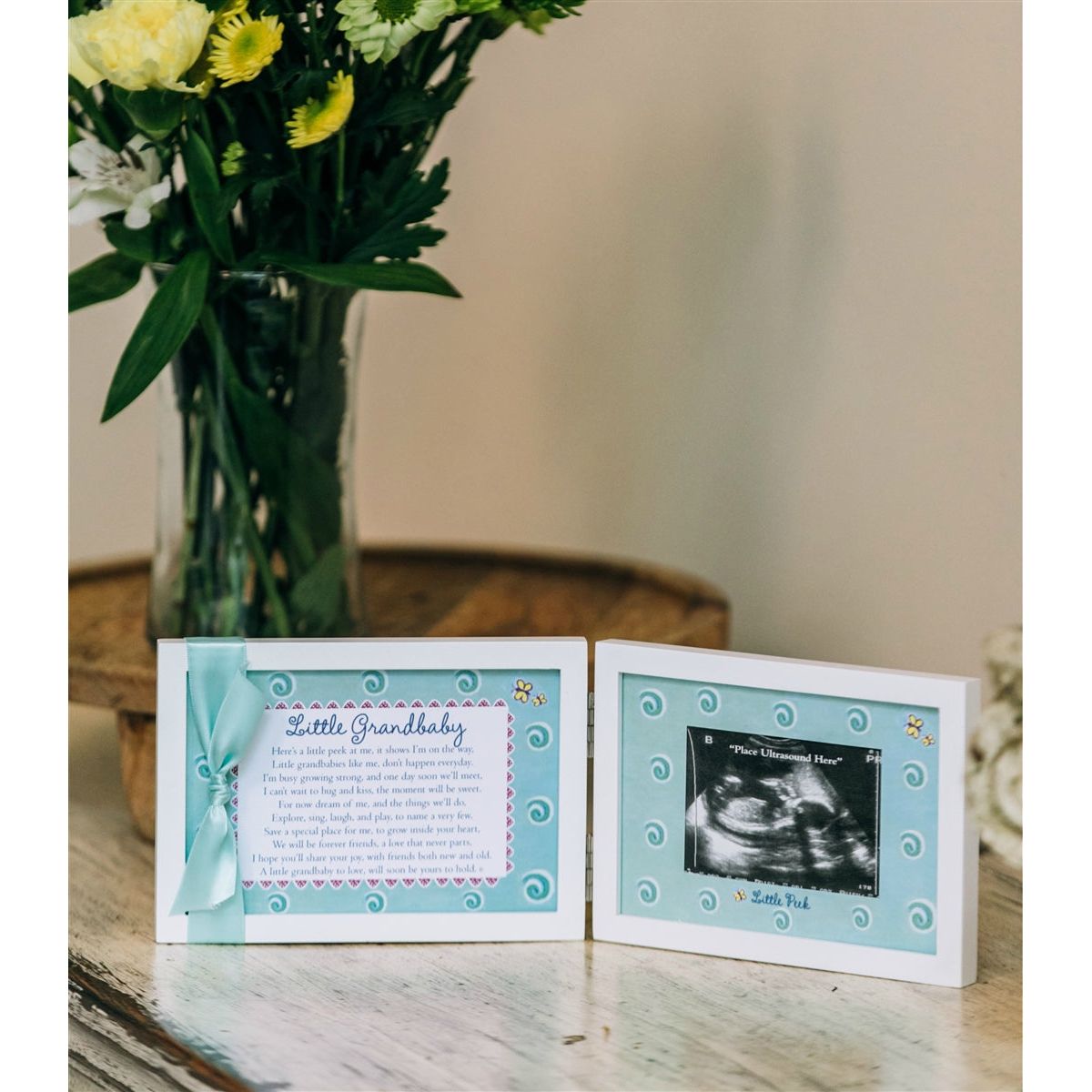 Little Grandbaby double frame in a living room setting.