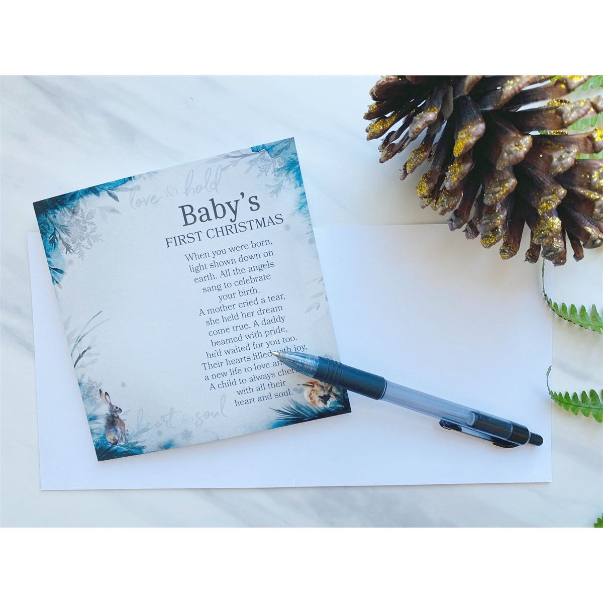 Baby's First Christmas card with space on the inside for the giver to write a note.