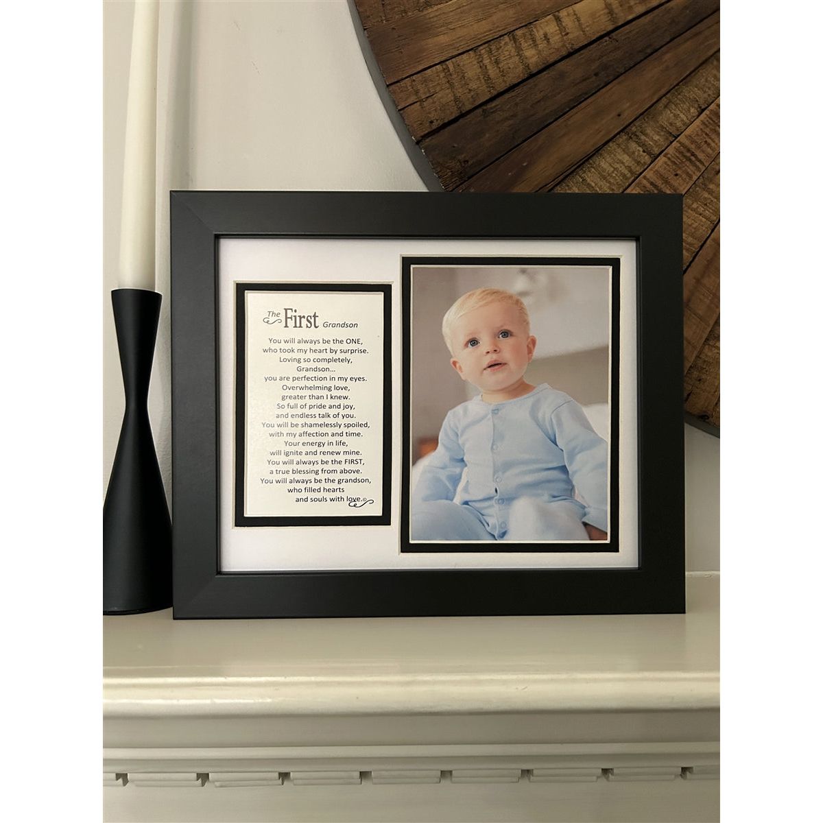 The First Grandson frame on a fireplace mantle.
