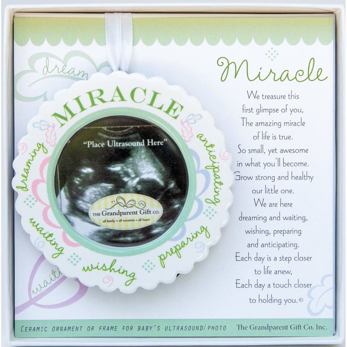 3" scalloped ceramic baby ultrasound ornament to hold 2.25" round sonogram image.  Ornament is gift boxed with "Miracle" poem folding card in a white 5.5"x5.5" box with a clear lid.
